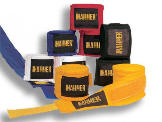 All-In Sport: Aus 100 % Baumwolle mit Daumenschlaufe und Klettverschluss. 5 cm breit und 2,5 m lang. Farben sortiert.
