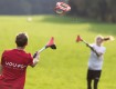 All-In Sport: YOU.FO - dé trendsport. Bij deze mix tussen lacrosse, hockey en frisbee wordt een aerodynamische ring met speciale sticks over max. 30 me...